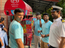 Even the grown boys  are equally ecstatic about ice cream in such hot weather